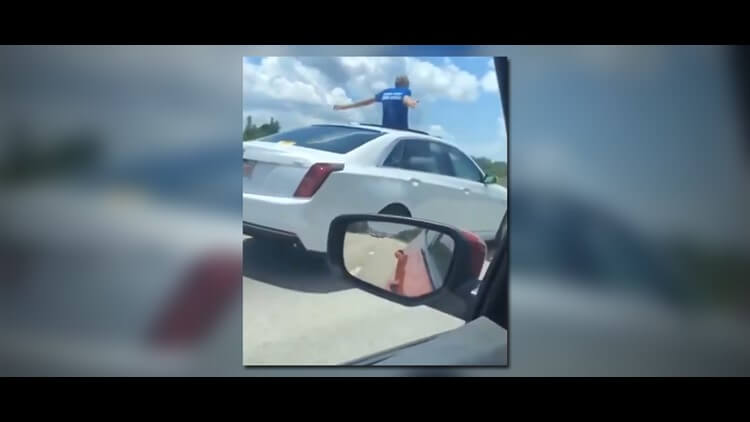 A Florida man driving on Interstate 4 has been spotted on the car's sunroof.
