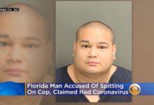 A Florida man alleged to have coronavirus has been accused of spitting on police