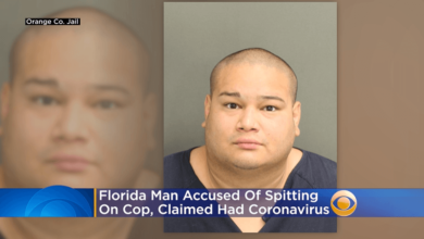A Florida man alleged to have coronavirus has been accused of spitting on police
