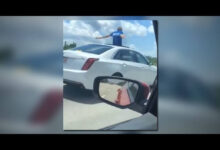 A Florida man driving on Interstate 4 has been spotted on the car's sunroof.
